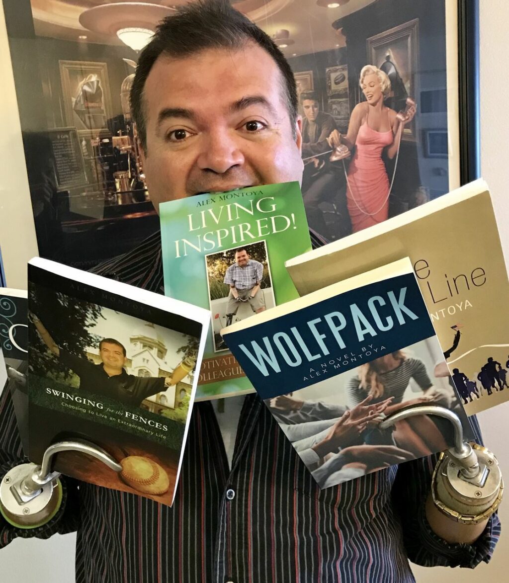 Alex Montoya holding his books