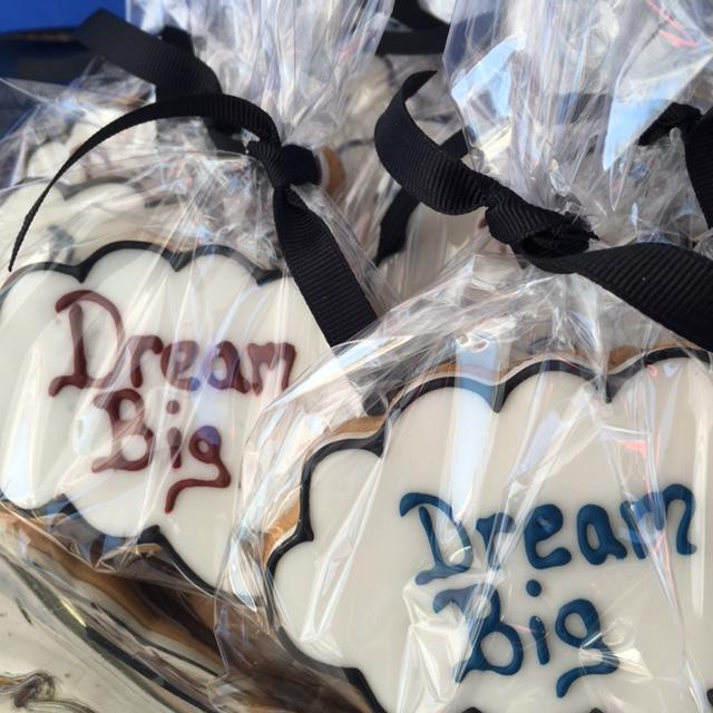 Sugar cookies that read "Dream big"