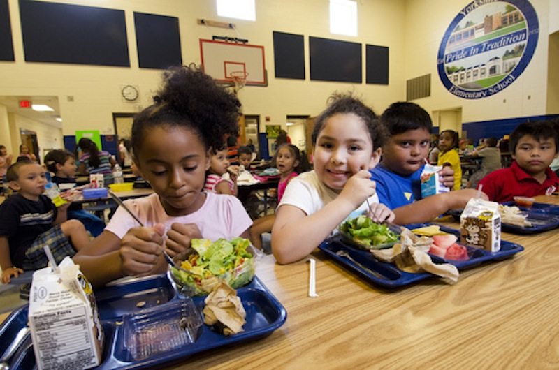 Children eating in cafeteria