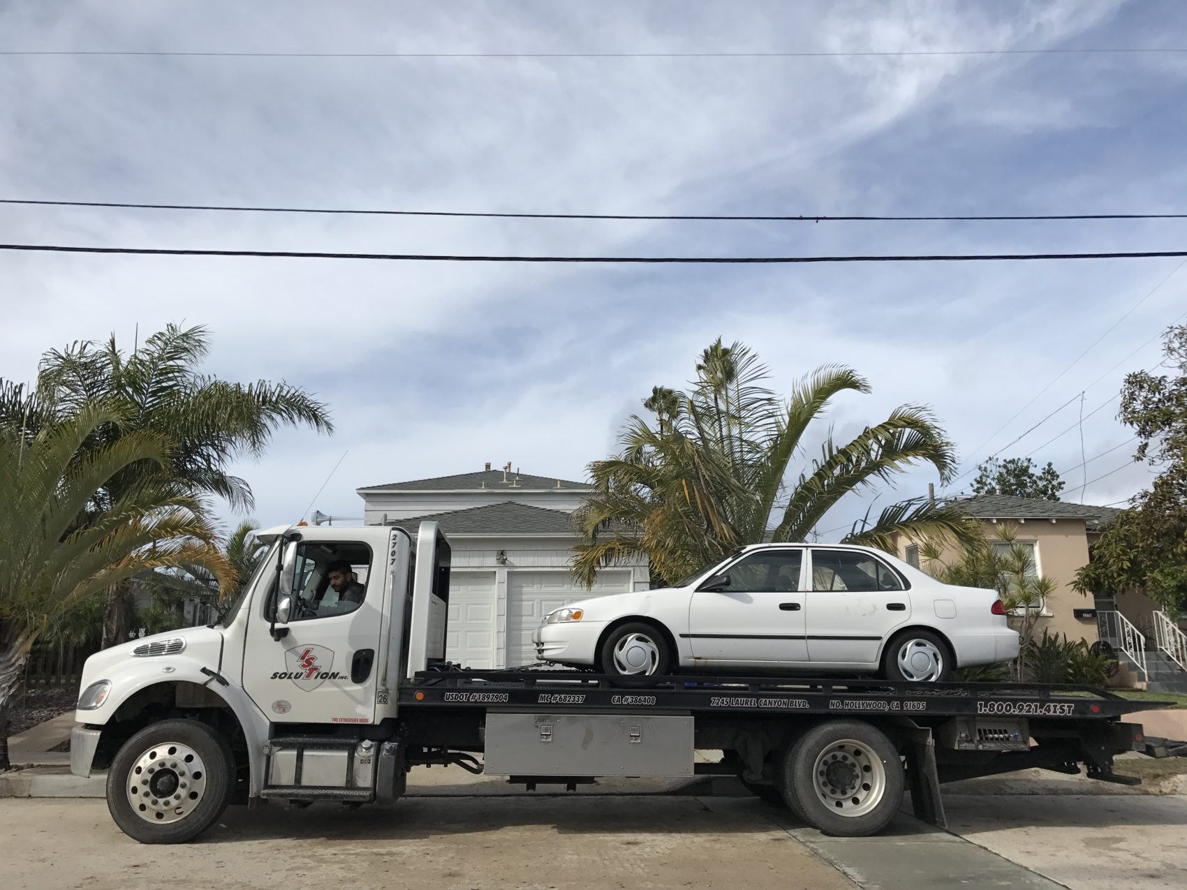 Car being towed