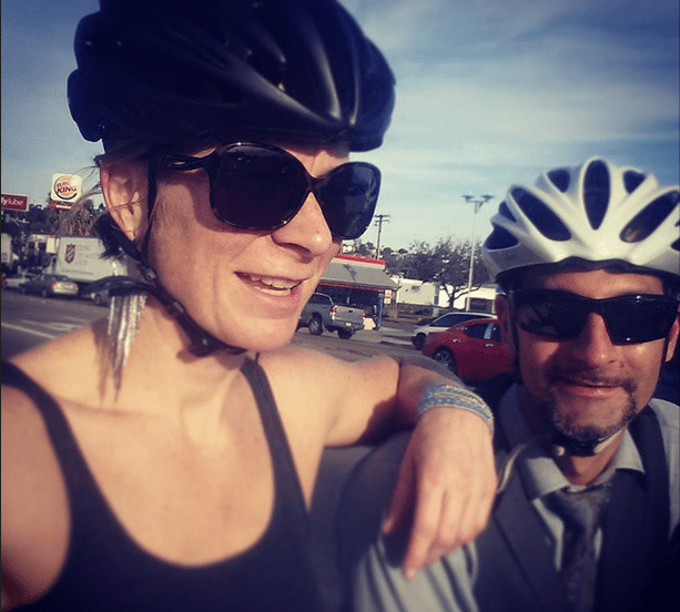 Jamie and Karim with biking helmets