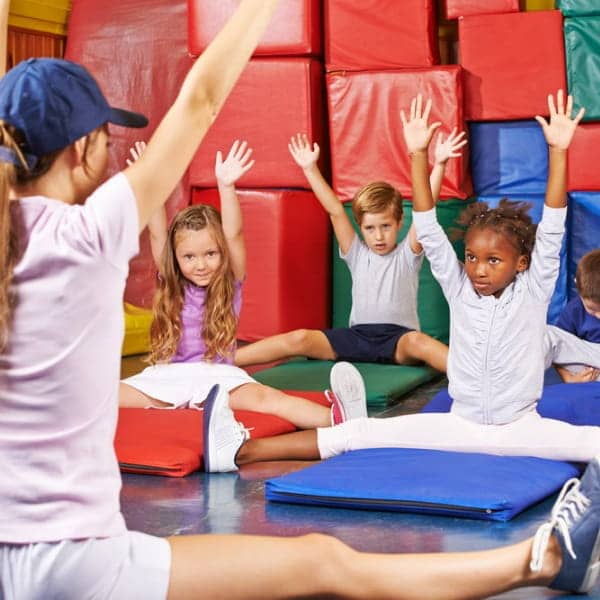 Children participating indoor exercise