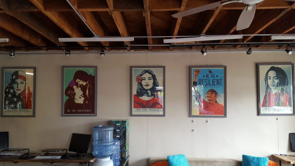 Protest posters framed on wall