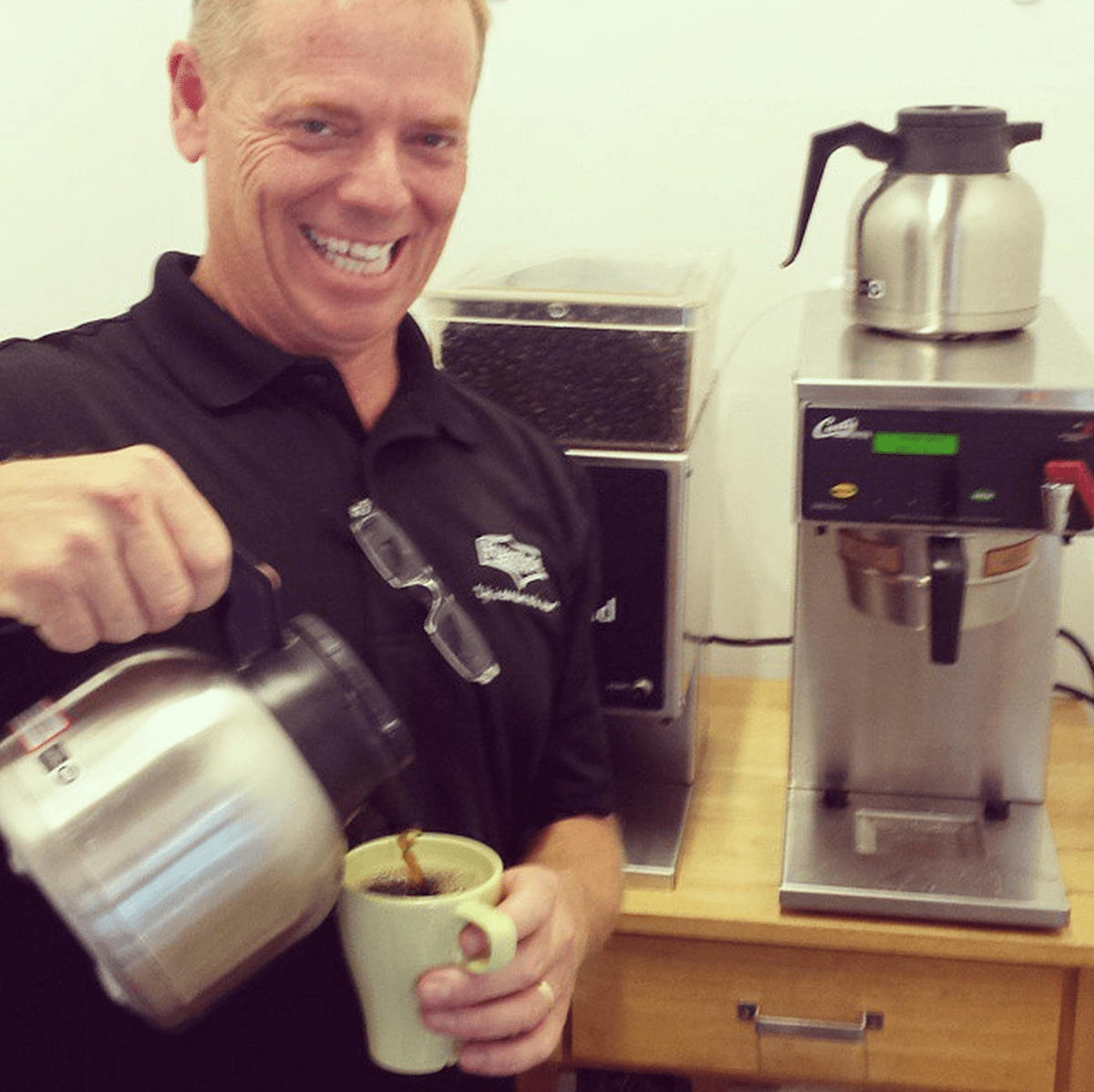 Staff pouring coffee